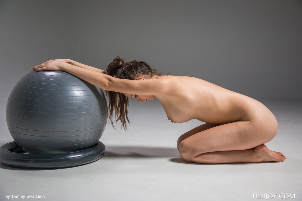 Alisa enjoying her naked workout session on a stability ball