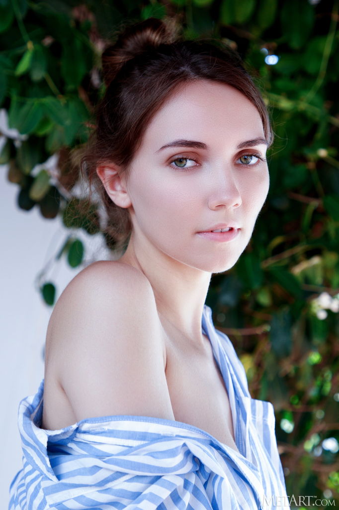 Danniela Unbuttoning Her Striped Shirt To Reveal Her Perfect Breasts