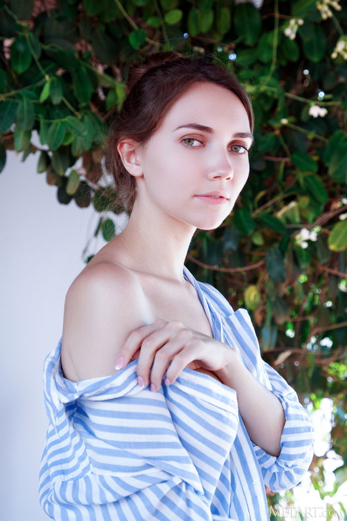 Danniela Unbuttoning Her Striped Shirt To Reveal Her Perfect Breasts