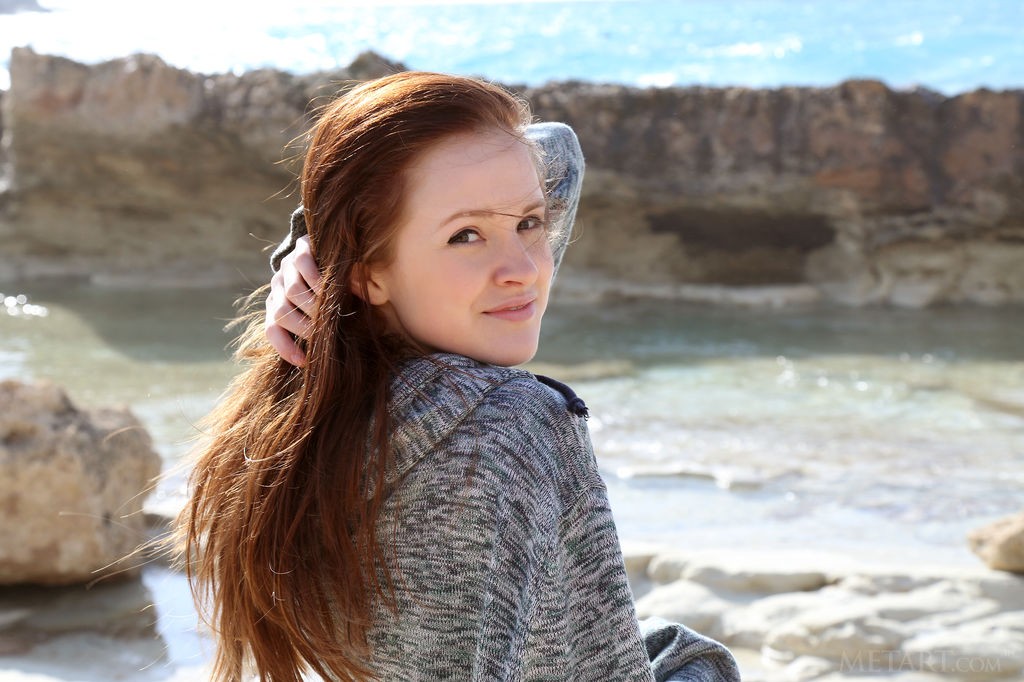 Alice May - Hot brunette enjoys herself on a rocky beach