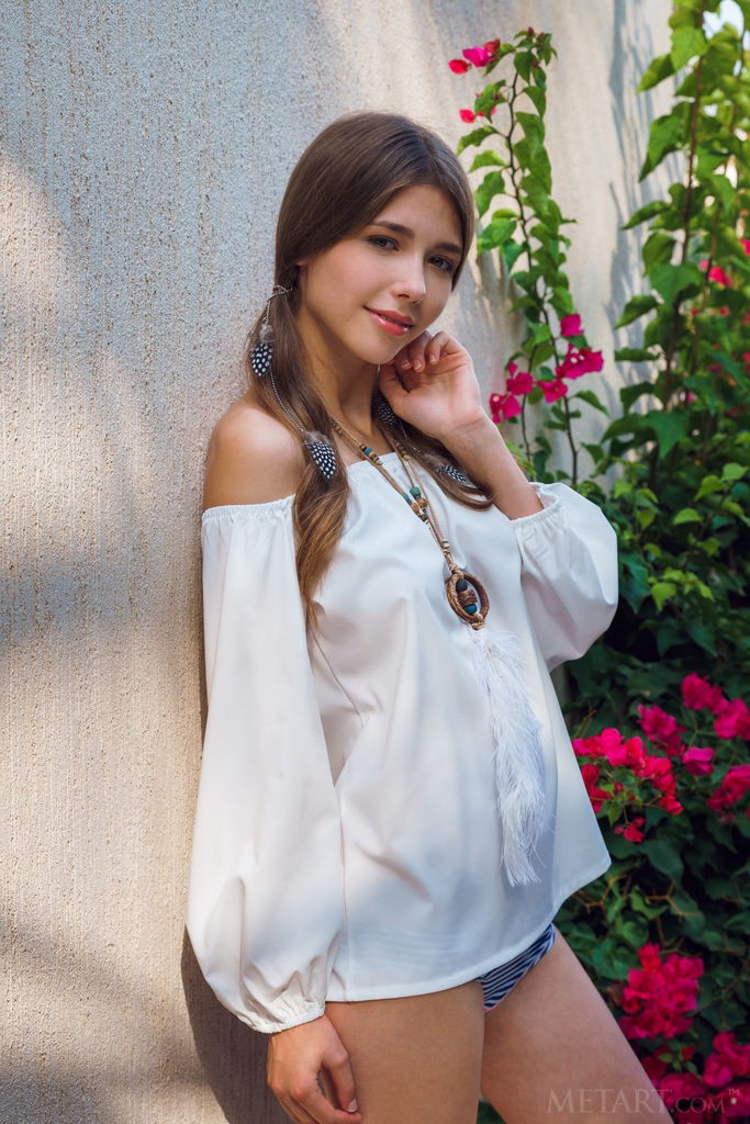 Mila Azul - Erotic photo shoot in the garden with a sensual brunette