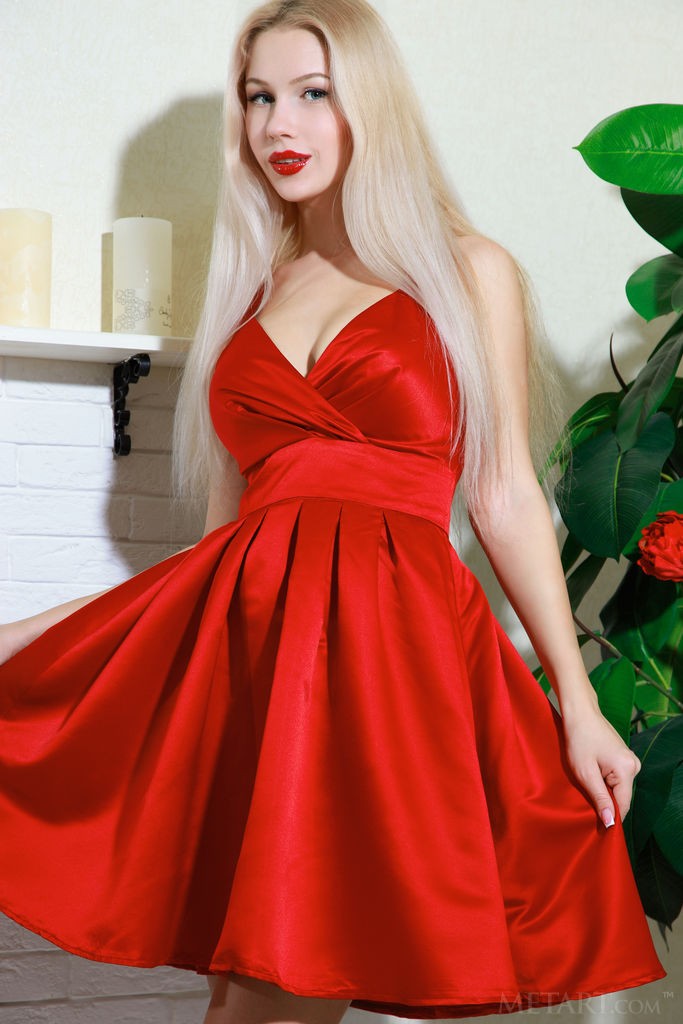Genevieve Gandi - Glamorous blonde MILF hottie posing in an elegant dress