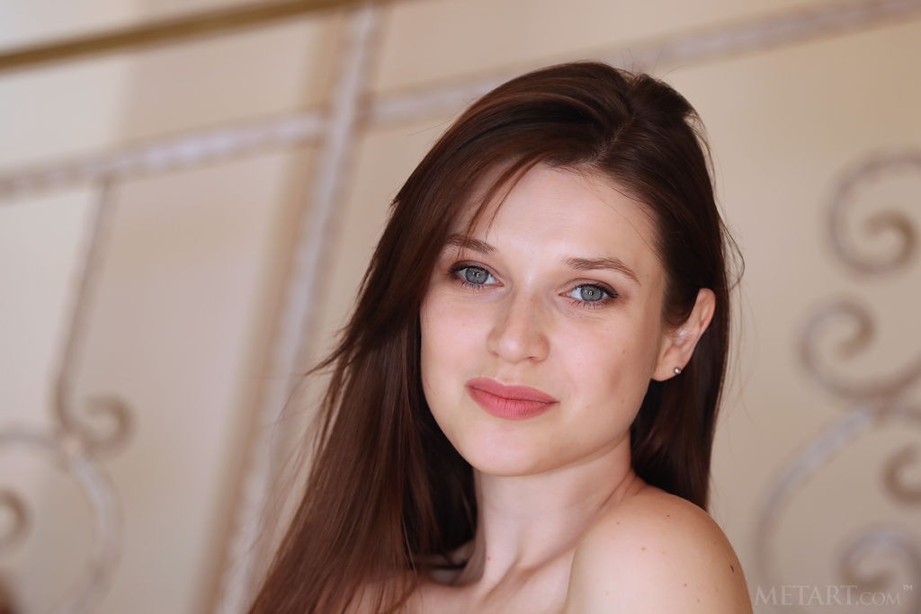 Serena Wood - Ravishing brunette babe poses naked on the stair case