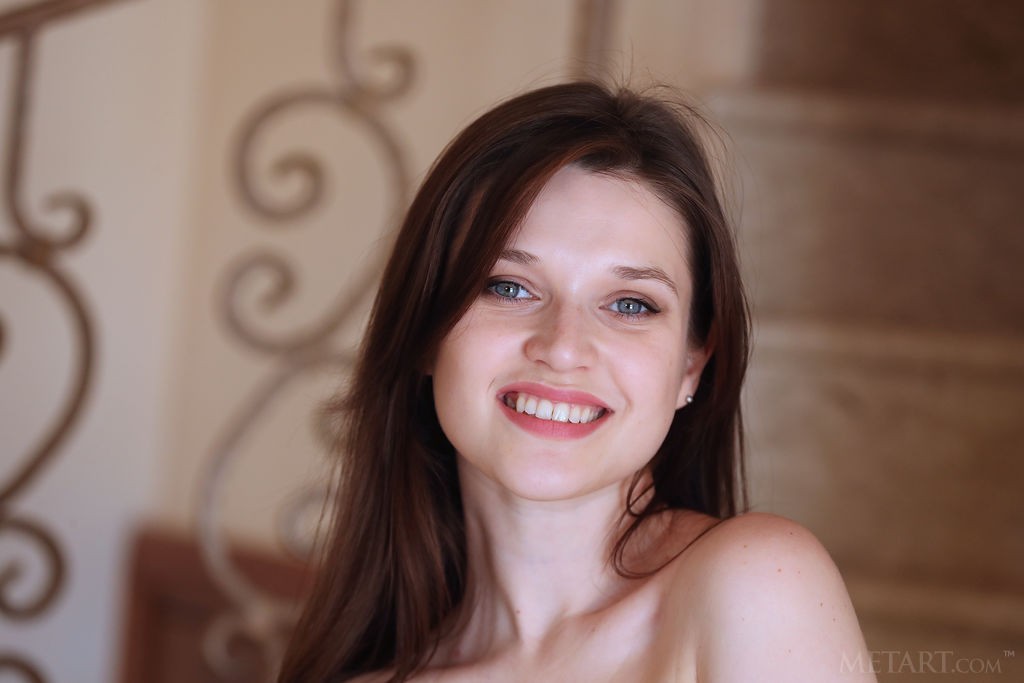 Serena Wood - Ravishing brunette babe poses naked on the stair case