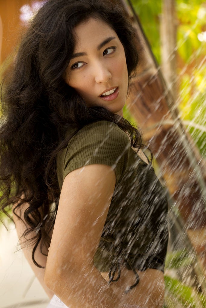 Crystal Wings - Yummy brunette plays with long legs in the armchair