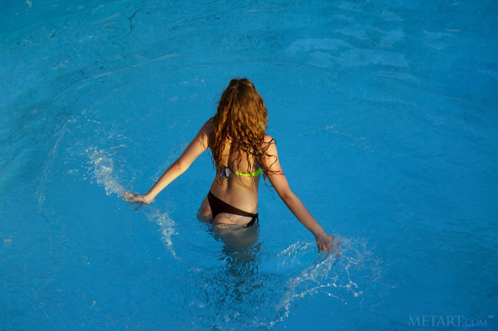 Zoeya - Stretching and posing naked tastefully by the swimming pool