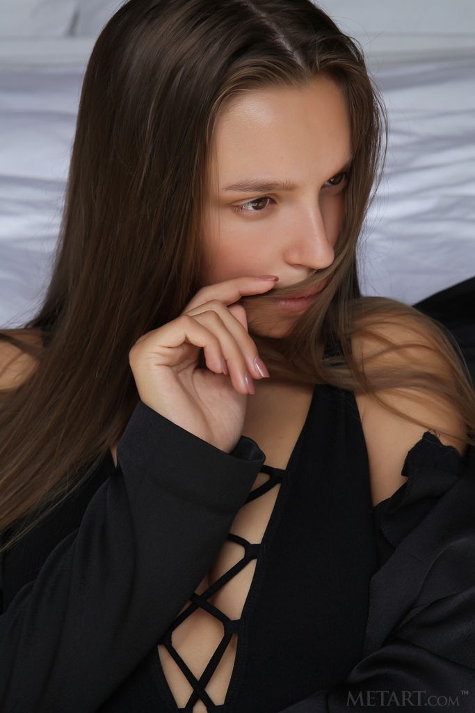 Elin - Writhing around on her bed wearing only her high heels