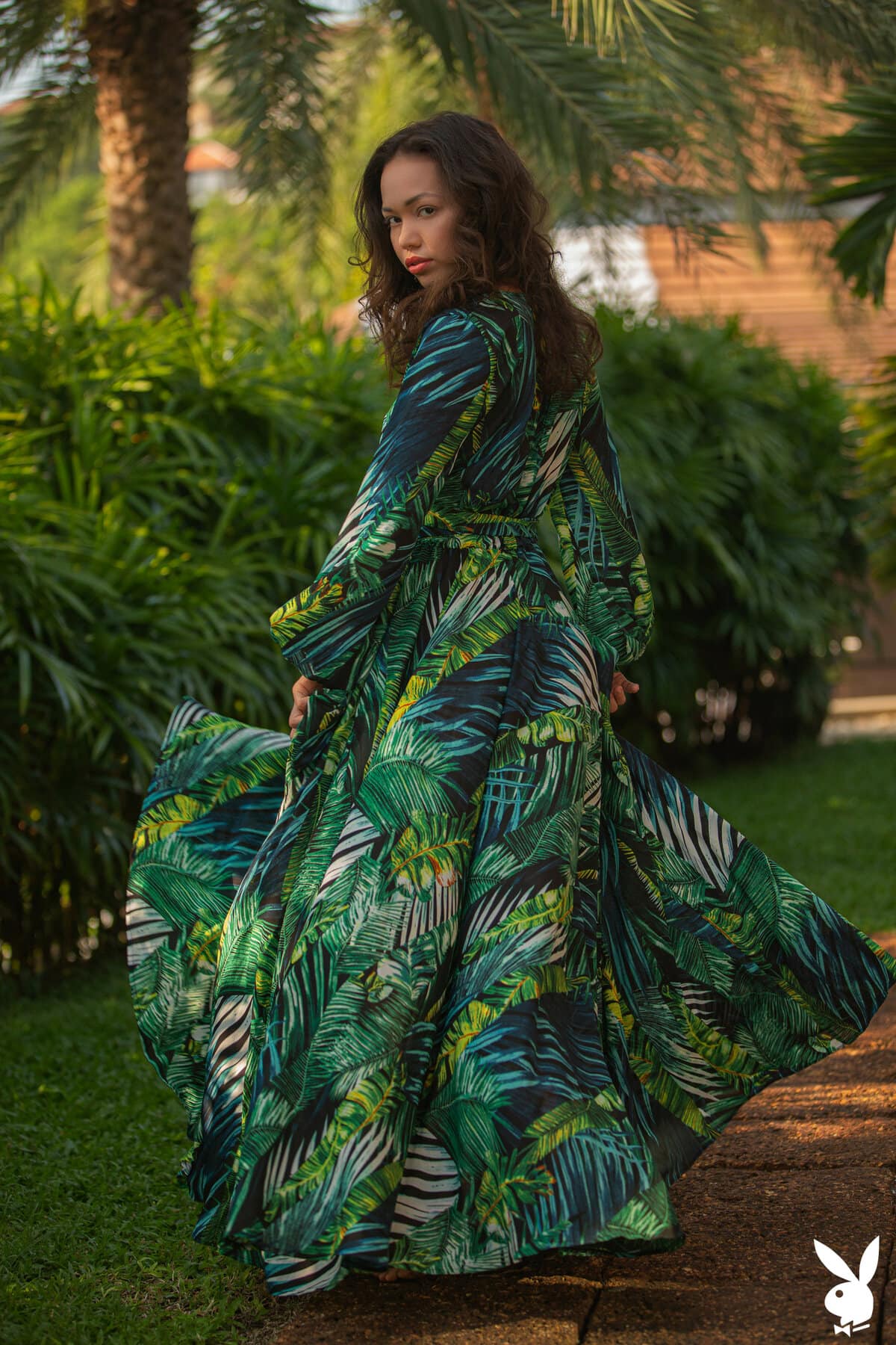 Kit Rysha looks adorable as she reveals her petite figure in the garden