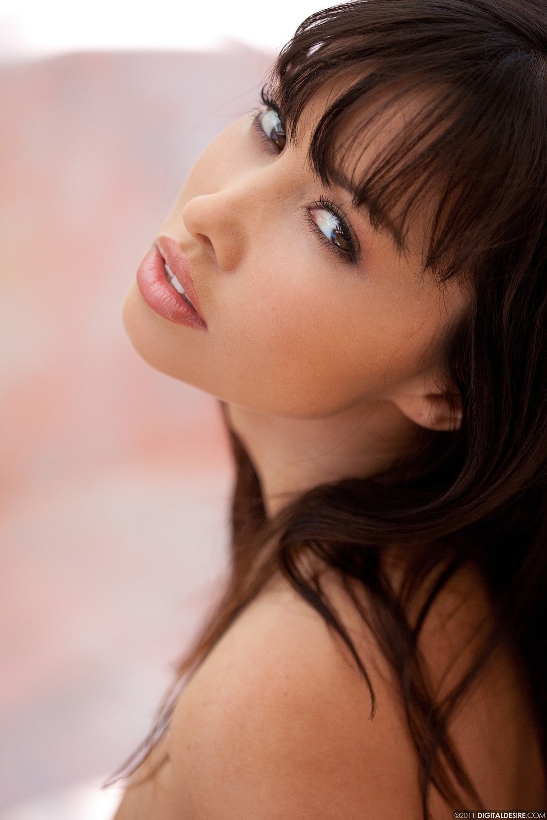Lana Lopez takes off her grey top