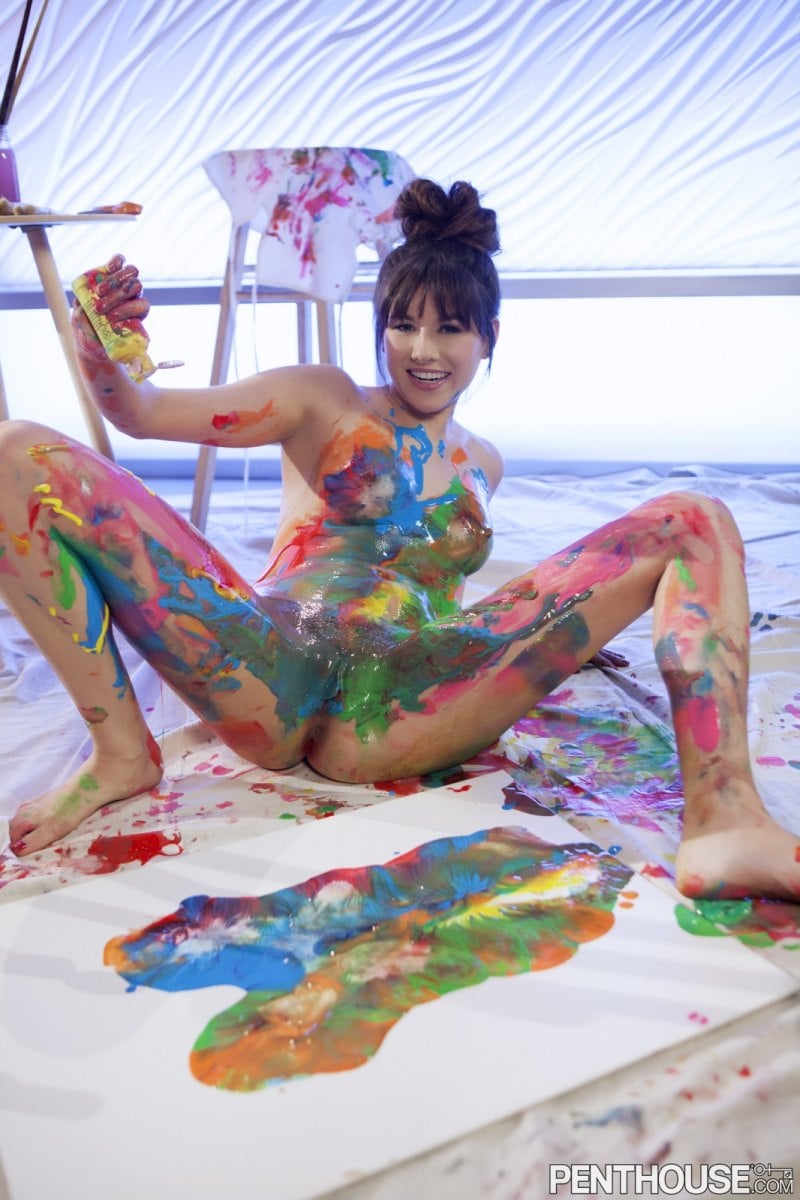 Shyla Jennings playing with paint on her seductive body
