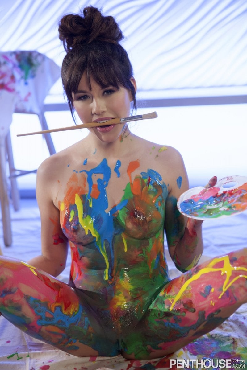Shyla Jennings playing with paint on her seductive body