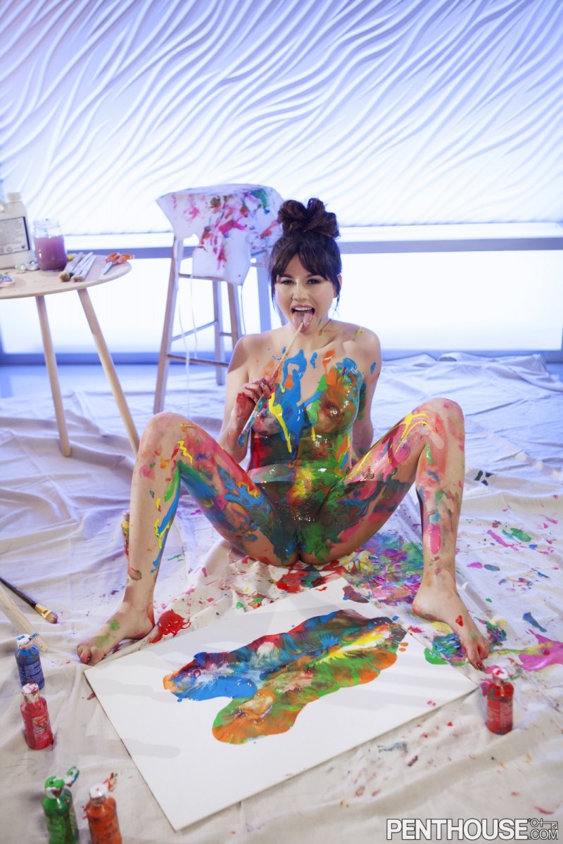 Shyla Jennings playing with paint on her seductive body